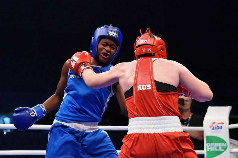 Shamonova of Russia in Red unleashes a big Left Hook against Tallya of France (Image Courtesy: AIBA)